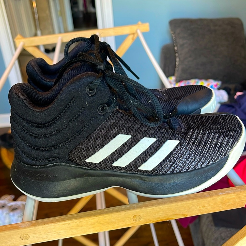 Adidas Youth basketball shoes.